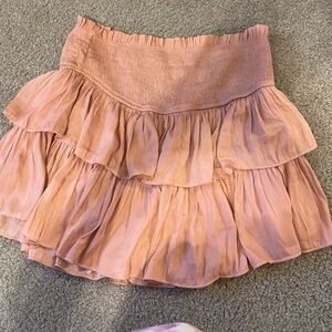 Pink flowy mini skirt with shorts attached